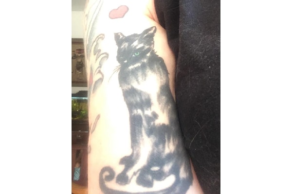 Ariel Gore's cat tattoo.
