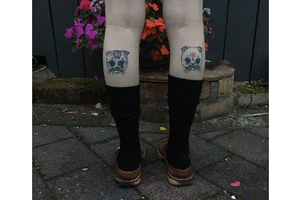 Erin Fae's cat tattoos.