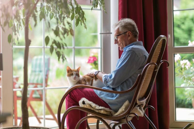 senior man with his cat