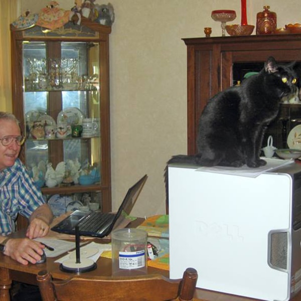 Midnight Son "helping" his Pops repair a computer -Submitted by Facebook user Faye Nicholas