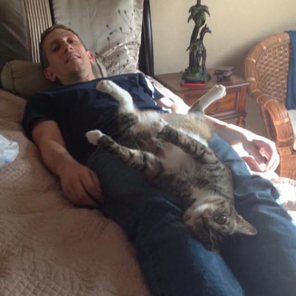 “My hubby not wanting to move because our cat, Panda, made herself comfortable.” -Submitted by Facebook user Heather Mertz