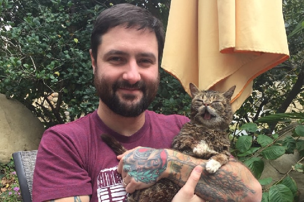 Lil Bub and Mike.