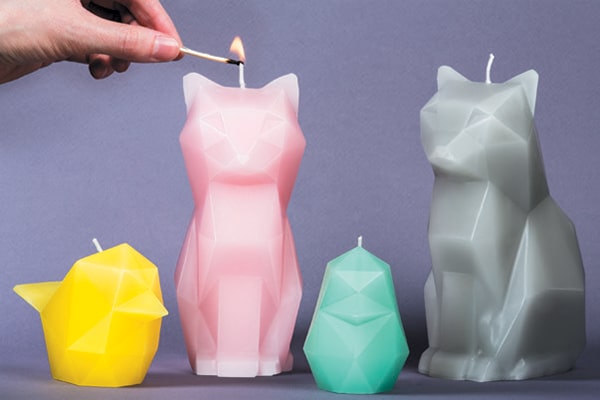 The Kisa cat candle comes in four different colors. Photography Courtesy 54celsius.com.