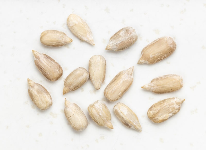 Sunflower seeds on white background