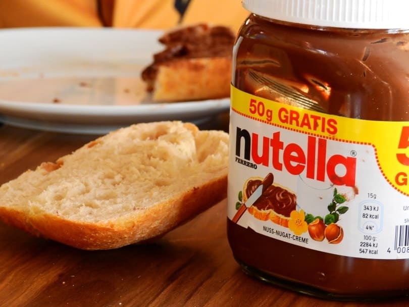 bread with nutella chocolate on the table