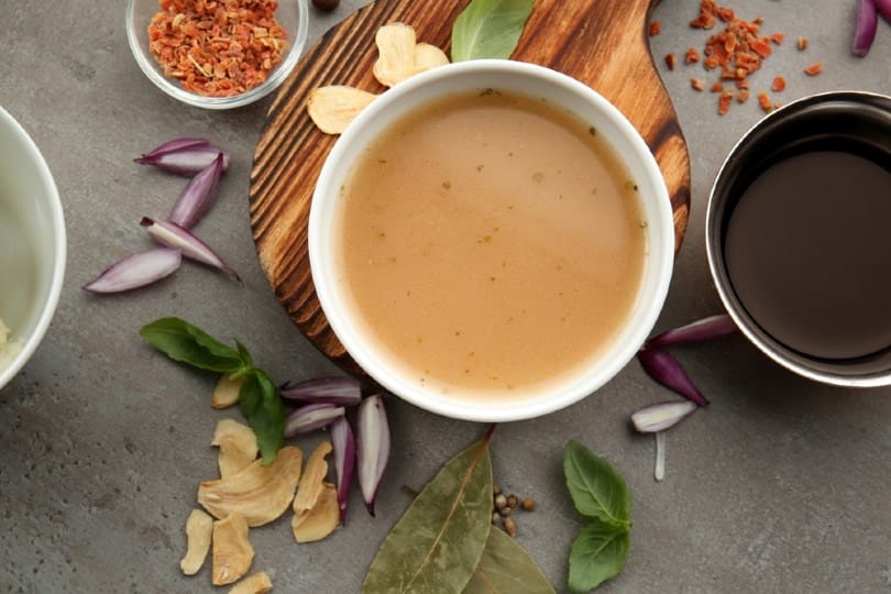 gravy and other spices on table