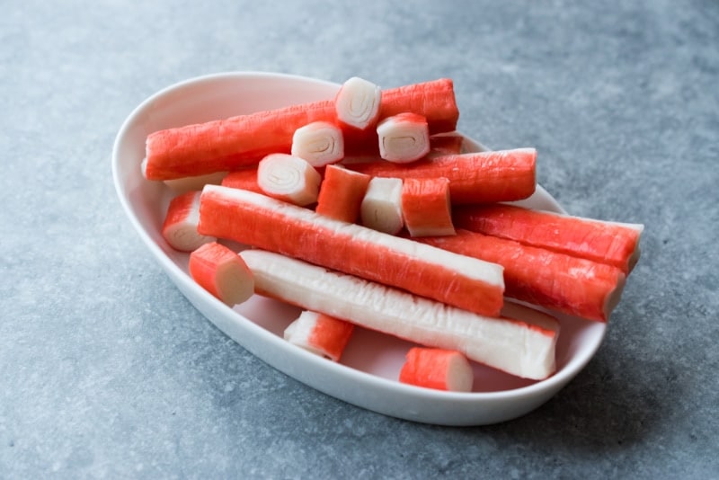 imitation crab sticks in ceramic bowl