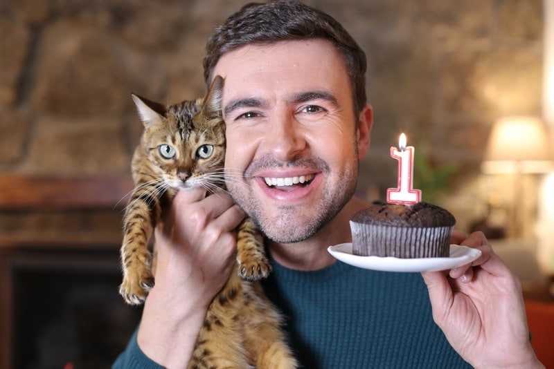 man celebrating his cats birthday