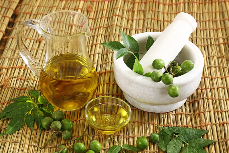 neem oil with mortar and pestle