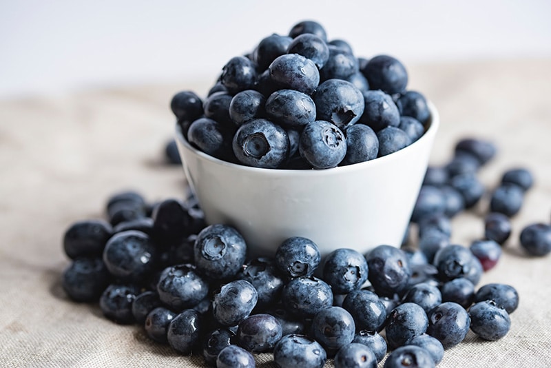 overflowing bowl of blueberries