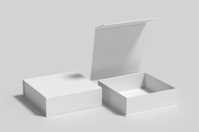 two white flip top boxes