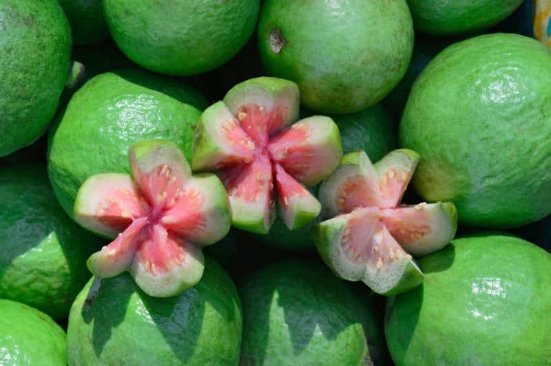 whole and sliced guavas