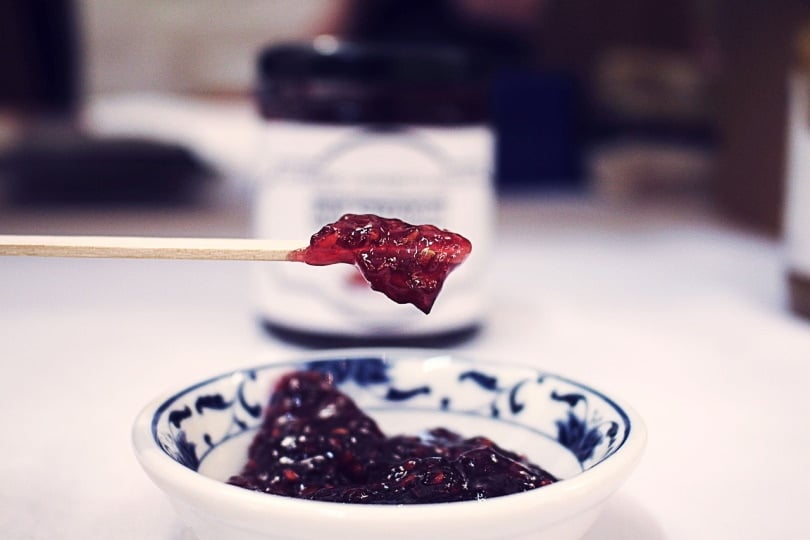 Jam on a spoon from a saucer