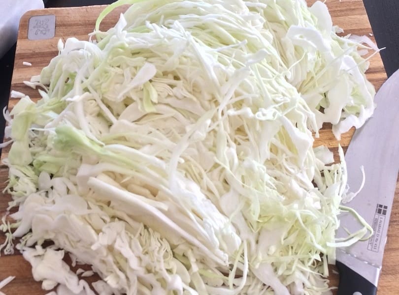 Sauerkraut on chopping board
