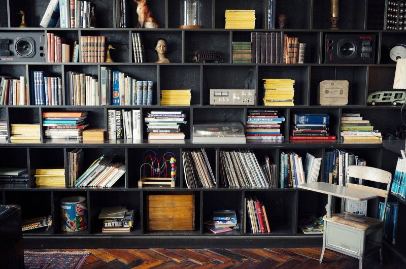 bookshelf with lots of books