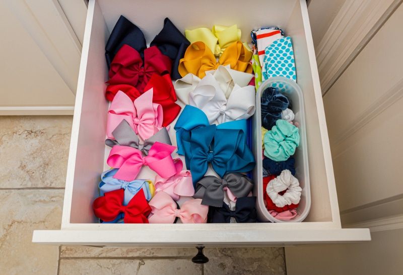 bows, scrunchies, and headbands organized in a drawer