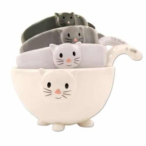 https://www.catster.com/wp-content/uploads/2023/12/cat-measuring-cups.jpg