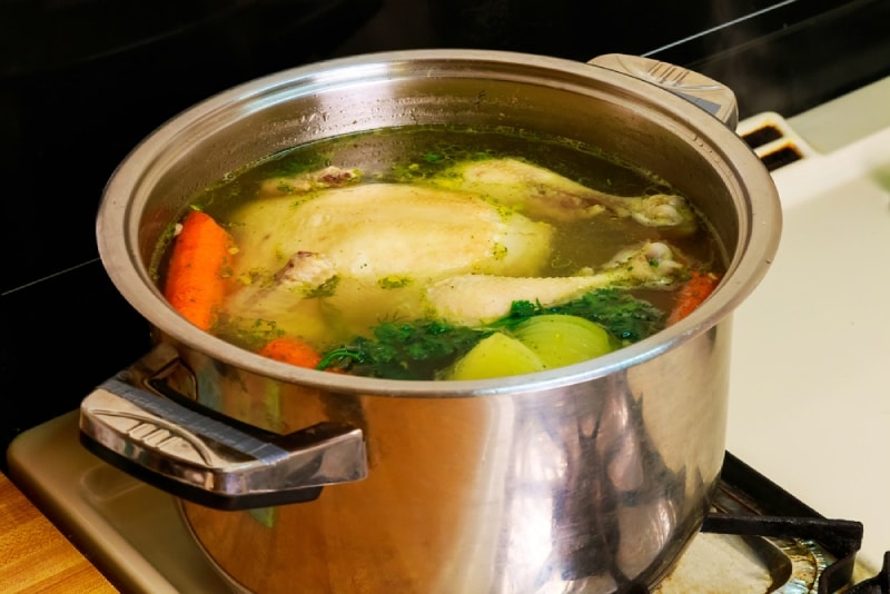 chicken broth cooking in a pot