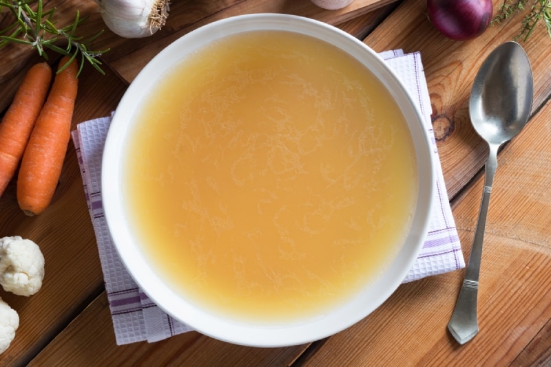 chicken broth on table