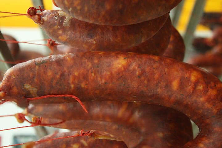 close up chorizos in the market