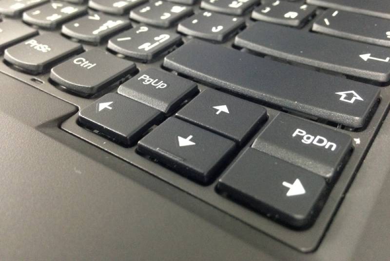 close up of arrow keys on a computer keyboard