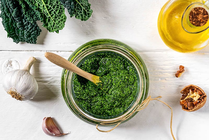 top view of a homemade pesto in a jar