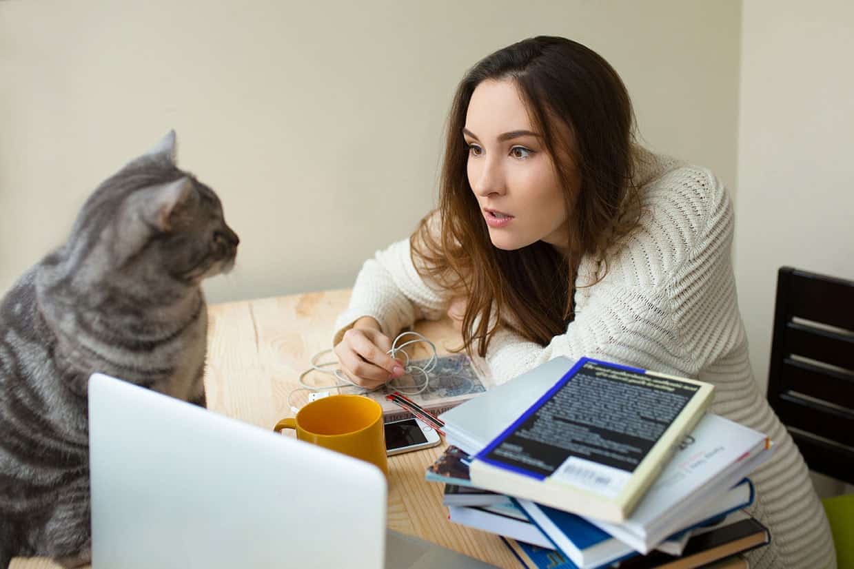 woman talking to her cat