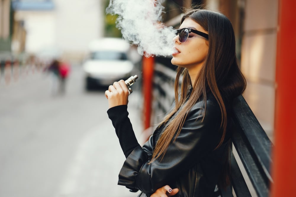 woman vaping outdoor