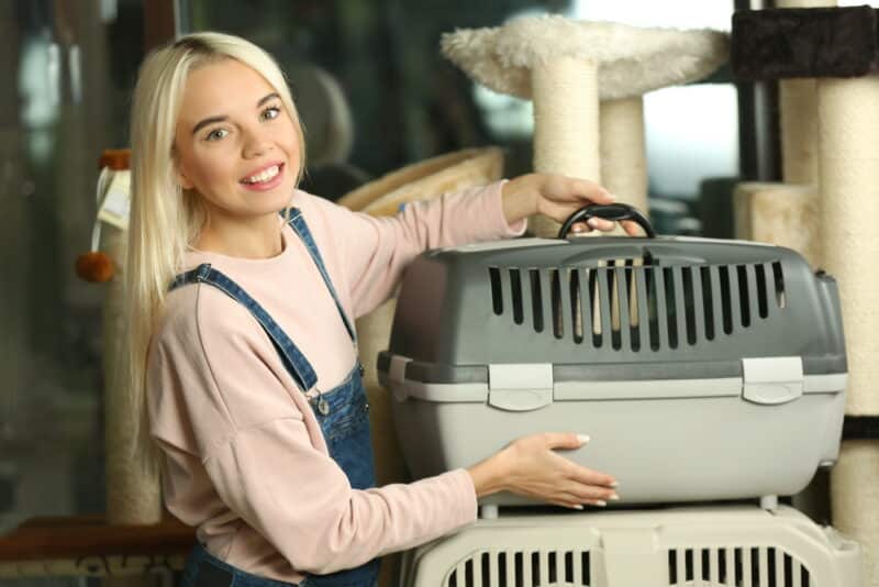 woman buying cat carrier