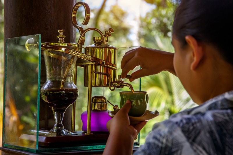 woman making kopi luwak
