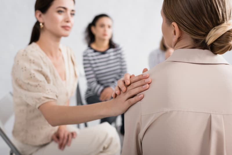 woman supporting her friend