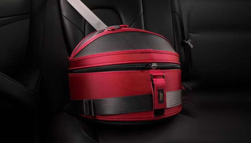 Sleepypod Mobile Pet Bed - product on the passenger seat in a car