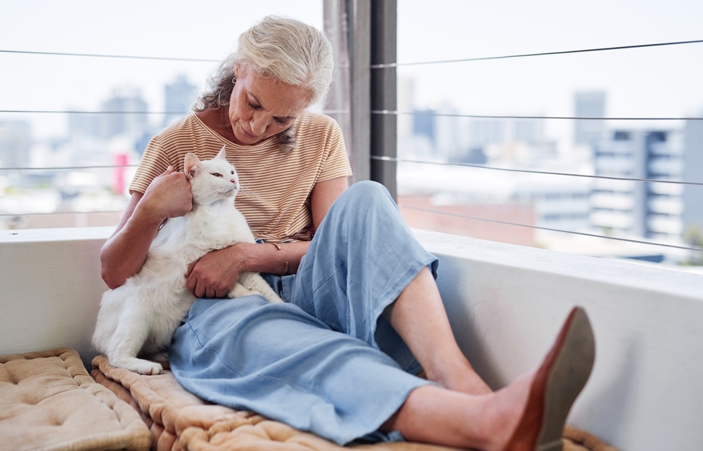 senior-woman-relaxing-with-her-cat