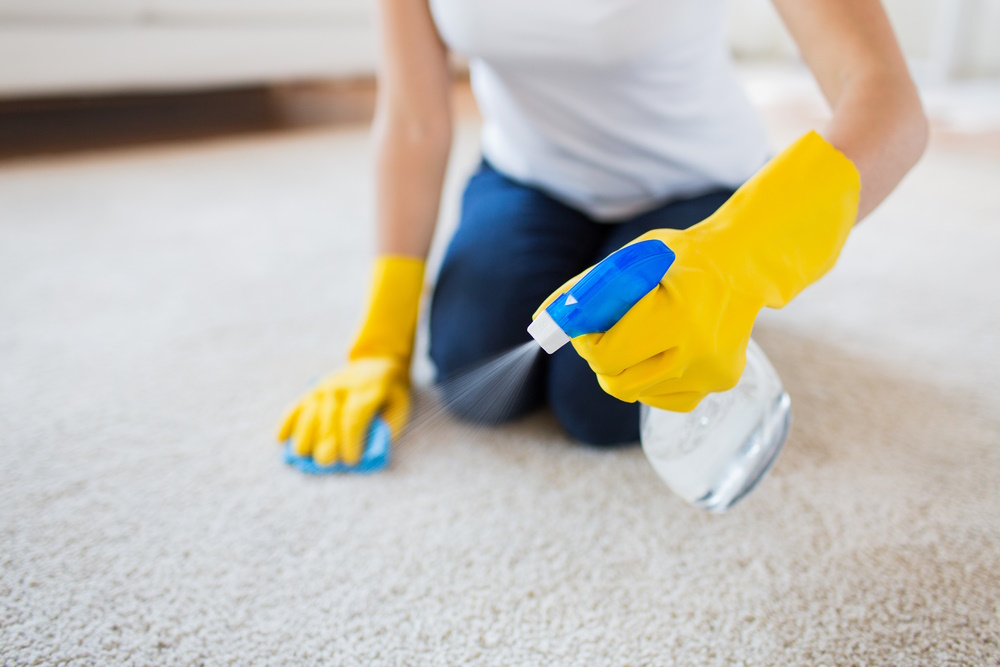 woman-cleaning-carpet