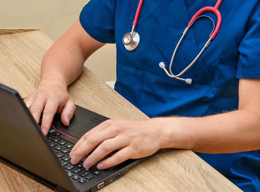 vet-using-a-laptop-for-online-consultation_PawelKacperek_Shutterstock.jpg.webp