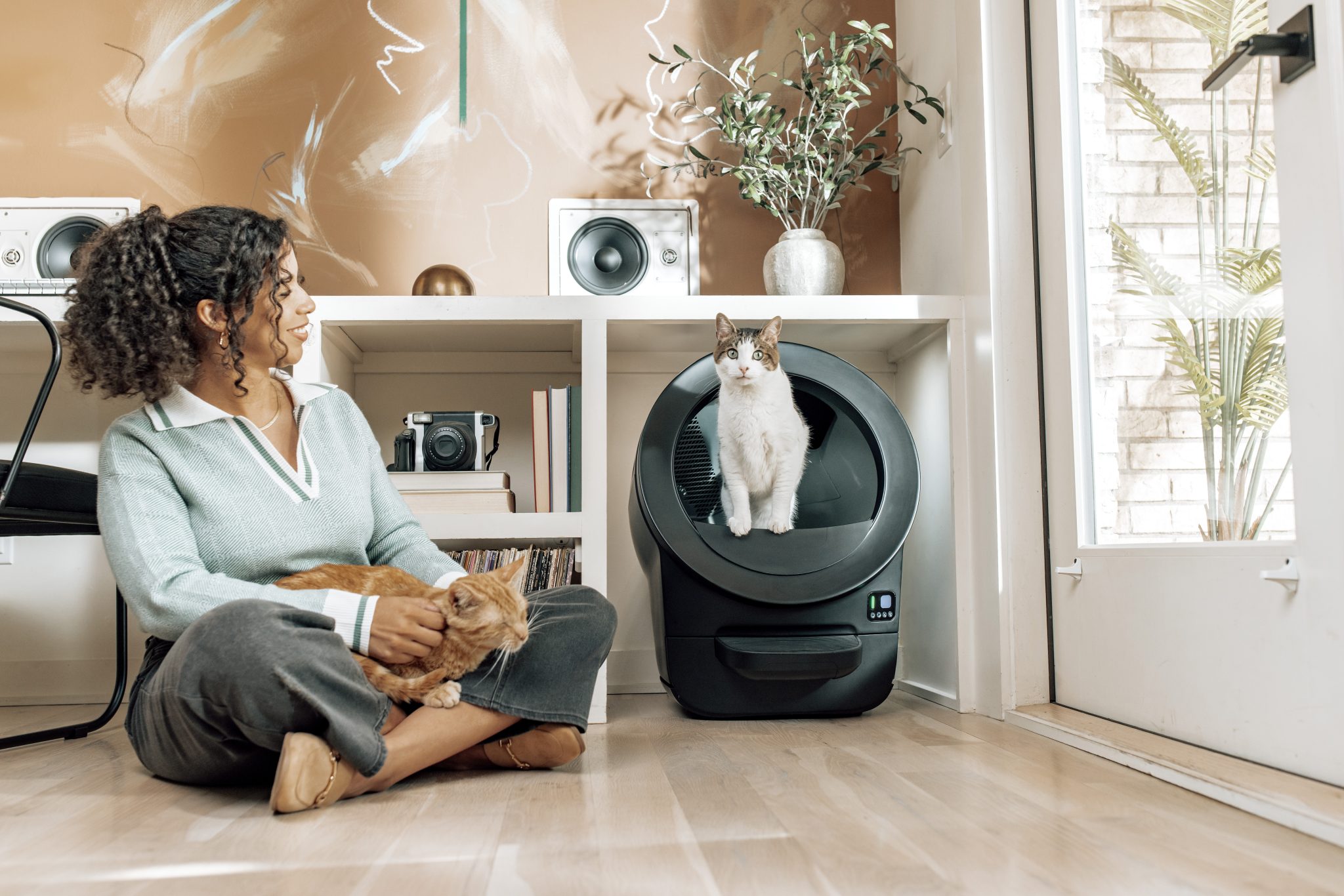 Whisker Sponsored - Woman petting cat Black LRE